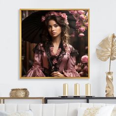 a woman with an umbrella is standing in front of a painting on the living room wall