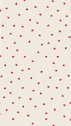 a red and white wallpaper with hearts on the back ground, in shades of beige and red