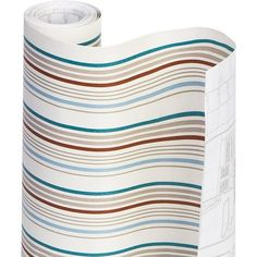 a roll of white and brown striped paper