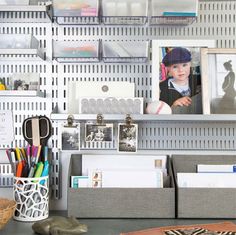 the desk is organized and ready to be used as a work space for someone's office