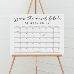 a white calendar on an easel with the words save the animal date written in black