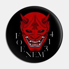 a red demon face with the word evil on it's chest and two horns