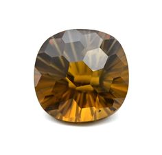 an oval shaped yellow diamond on a white background with the light reflecting off it's face