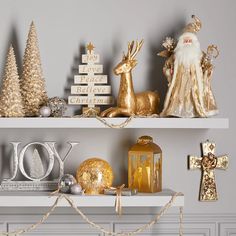 christmas decorations on shelves with gold and silver ornaments