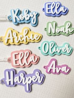 the name badges are all different colors and font options for children's hair accessories