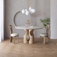 a white table and two chairs in a room