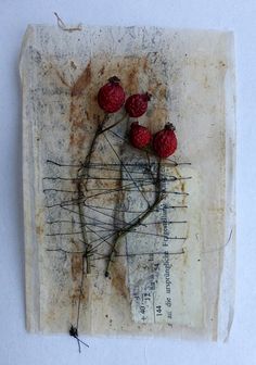 an old piece of paper with strawberries on it