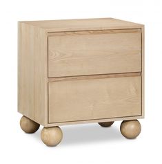 a wooden cabinet with wheels on the bottom and one drawer in the middle, against a white background