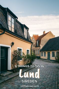 a cobblestone street with houses in the background and text that reads 6 things to do in land sweden