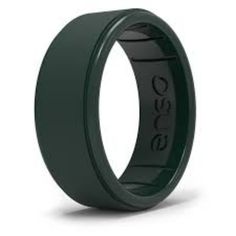 a green ring with black lettering on the side and an oval design in the middle