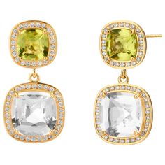 Created in 18kyg Peridot cushions 2.5 cts approx Rock crystal cushions 8 cts approx Diamonds 0.60 cts approx Limited edition Elevate your look with these limited-edition Candy Blue Topaz & Diamond Earrings, created with 18kyg for a timelessly luxurious feel. Delicately cut Peridot and Rock Crystal cushions framed with intricate Diamond accents totaling 0.60 cts create an exquisite display, perfect for formal and special occasions. About the Designers ~ Dharmesh & Namrata Drawing inspiration from Champagne Diamond Earrings, Lalique Crystal, Contemporary Earrings, Crystal Champagne, Crystal Diamond, Gold Monogram, Colored Gems, Brown Diamond, Champagne Diamond