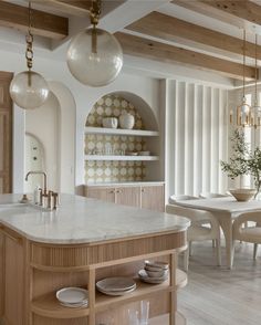 the kitchen is clean and ready to be used for dinner or breakfast time, as well as dining room furniture