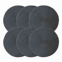 four black round rugs on a white background