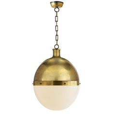 a brass and white light hanging from a chain