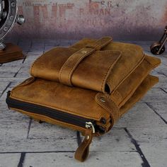 This messenger bag is made of cowhide genuine leather, top-quality zippers,  zip closure, leather and excellent workmanship, contemporary type design, vintage, fashion and luxury.   The distressed rustic man messenger bag has a rugged durability, so this men bags will stand the test of time.This leather men bag has extra pockets to store and organize your personal gear and tech gear.This genuine messenger bag can be placed on the waist as a funny pack.  
 ITEM FEATURES   
 - 1 x Front Pocket Rugged Leather Bag With Zipper Pocket, Rugged Brown Bag With Zipper Pocket, Messenger Bag For Men, Vintage Messenger Bag, Belt Pack, Messenger Bag Men, Mens Leather Bag, Leather Messenger Bag, Waist Pack