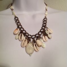 A personal favorite from my Etsy shop https://www.etsy.com/listing/217448413/rustic-shell-necklace-white-beige-and Bohemian Cream Jewelry For Jewelry Making, Handmade Bohemian Cream Necklace, Bohemian Shell Jewelry In Cream, Bohemian Shell Cream Jewelry, Bohemian Cream Shell Jewelry, Unique White Shell Necklace, Vintage White Necklace For Beach, Handmade Long Beige Necklace, Handmade Beige Long Necklace