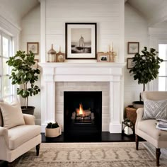 a living room filled with furniture and a fire place in the middle of a fireplace