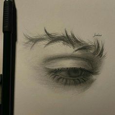 a pencil drawing of an eye