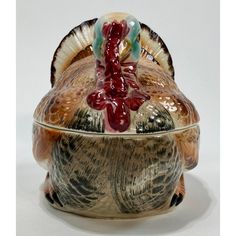 a ceramic figurine that is shaped like a turkey