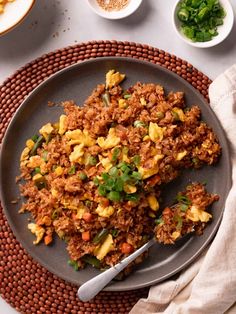 a plate with rice and vegetables on it