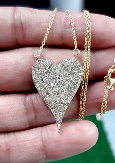 "Pave Diamond Heart Pendant Necklace 925 Sterling Silver 14k Gold Plated 16+3'' Chain 25mm Pendant 925 Silver Weight : 4.71 gm Diamond Weight(Carat) : 1.45ct Stone Weight(Carat) : 0.00 Item Size (MM) : 25mm Chain ( 16+3\" ) Gross Weight : 5.00 gm With Chain Thanks For Visit Our Store Payment policy We accept the payment via paypal only. Shipping policy We Ship the item as per our shipping policy once we receive the payment. Return policy We accept the return within 30 days and item should be ret Gold Diamond Cut Sterling Silver Heart Necklace, Valentine's Day 14k Stamped Silver Jewelry, Elegant Heart Pendant Necklace With Pave Setting, Formal Heart-shaped Diamond Necklace With Pave Setting, Heart-shaped Necklace With Pave Setting, Silver Heart-shaped Diamond Necklace With Pave Setting, Valentine's Day Heart Pendant Necklace With Pave Setting, Diamond Fashion Jewelry, Diamond Heart Pendant Necklace