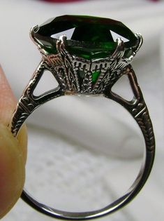 Green Emerald Ring, simulated gemstone, classic solitaire Victorian style Ring Formal Silver Ring With Round Emerald Stone, Silver Emerald Ring With Round Stone For Formal Occasions, Elegant Engraved Round Emerald Ring, Elegant Silver Emerald Ring Collectible, Emerald Filigree Ring Gift, Emerald Ring With Filigree For Gift, Antique Filigree Solitaire Ring As Gift, Elegant Round Emerald Filigree Ring, Round Emerald Ring With Filigree For Gift