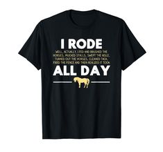 a black t - shirt with the words i rode all day on it