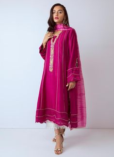 Pakistani designer cotton net dress for party wear in fresh red color. Dress is embellished with sleek paneled cotton net shirt enlightened with elegant hand made neckline with pearls. Overall dress has embellished with single dhaagha thread work and french knots. Dupatta: Pakistani designer cotton net dress comes with beautiful double tie and die silk dupatta in pink and purple shades. Detailed Description: SKU: P2271 Detailing: Pearls and thread work Colour: Red Fabric: Cotton net and silk Des Cotton Net Dresses, Red Color Dress, Dresses With Pearls, Tie And Die, Net Dresses, Semi Formal Outfits, Luxury Pret, Latest Dress Design, Indian Designer Suits