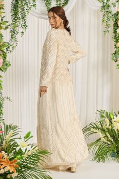 Buy Ivory Foil Georgette Embroidery Pearl Subh Bela Cape Saree Set For Women by Nidhika Shekhar Online at Aza Fashions. Embroidered White Georgette Gown, Elegant White Gown With Chikankari Embroidery, Traditional Cream Dress With Pearl Embroidery, Cream Fitted Gown For Eid, Fitted Cream Gown For Eid, Off White Designer Dresses With Pearl Embroidery, Designer Off-white Dresses With Pearl Embroidery, Elegant Off White Gown With Intricate Embroidery, Cream Festive Dress For Ceremony