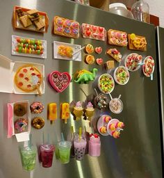 a refrigerator covered in lots of different types of food and drink on it's side