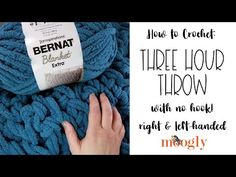 a woman's hand on top of a blue blanket with text over it that reads bernat three - hour throw