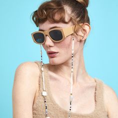 To see all our 85 different colours sunglasses chains please click on the link below. https://www.etsy.com/uk/shop/ChainsAndShades?section_id=37905546 Hand strung, four pieces square baroque pearls, round mother of pearls and faceted mix semi-precious stones. Gold plated , non tarnish beads, clasps and connectors. Can be worn as a necklace and glasses chain or simply as a mask holder. Comes with extra set of rubber loops. Length: 70cm approx. Trendy Party Glasses Chains With Adjustable Chain, Trendy Adjustable Party Glasses Chains, Trendy Pearl Glasses Chain As Gift, Trendy Summer Glass Jewelry, Elegant Summer Party Glasses Chains, Trendy Handmade Glasses Chains For Party, Trendy Beaded Glasses Chains As Fashion Accessory, Elegant Glass Glasses Chains For Beach, Party Pearl Glasses Chain