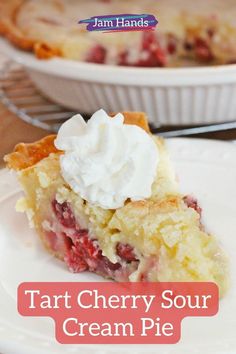 a slice of pie with whipped cream on top sits on a plate next to another pie