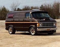 an old van parked in a parking lot