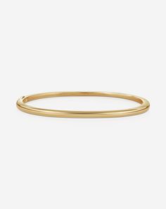 Stackable Gold Cloud Bangle- Slim in Yellow Gold product still Elegant Hoop Bangle With Polished Finish, Classic Gold Hinged Bangle, Elegant Oval 14k Gold Bangle, Elegant 14k Gold Oval Bangle, Classic Formal Bangle Bracelet, Classic Oval Bangle For Wedding, Minimalist Yellow Gold Hoop Bracelet, Classic Oval Wedding Bangle, Modern Hoop Gold Bracelet For Formal Events