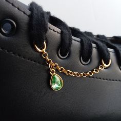 Listing Is For One Shoelace Swag Shoe Chain With Closed Back Green Rhinestone Tear Drop Charm . Handmade With New Materials Mixed Metal Hardware In Gold Tones . Run Your Shoelace Through The Oval Eyelet In A Desired Location On The Shoe. Do A Few Laces Crosses And Run The Lace Through The Second Eyelet To Secure To The Side Of The Boot Or Shoe. . Approx 3" Long. Measurements In Phots. . Not Just For Roller Skates! . This Swag Chain Looks Fantastic On Dr. Martens, Vans And Other Footwear With Lac Nike Shoe Chain, Shoe Lace Charms Diy, Diy Shoe Laces Ideas, Shoe Lace Charms, Sneaker Charms, Mixed Metal Hardware, Shoe Chains, Shoelace Belt, Shoelace Charms