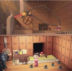 an animated scene with cats and mice in a room that is made out of wood