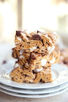 a stack of cookies and marshmallows on a plate