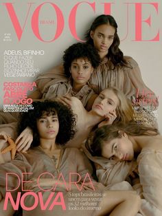 three women laying on top of each other on a cover of the magazine vocue