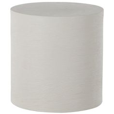 a white round table with wavy lines on it