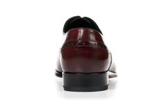 Every man needs a staple oxford dress shoe in his wardrobe. Enter, the Brando, our signature semi-brogue oxford that will ensure you own the room. Runs full size large (order full size down from regular US dress shoe size). For example, if you normally wear a size US 10 dress shoe, order a size 9 Alternatively, order one and a half sizes below your Brannock device measurement. For example, if you measure a 10 on the Brannock, order a size 8.5 Full-grain Italian calfskin leather Matching closed-c Navy Pinstripe Suit, Professional Wear, Black Dress Shoes, Pinstripe Suit, Havana Brown, Oxford Dress, Dress Shoe, Every Man, Handmade Shoes