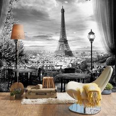 the eiffel tower in paris, france is seen through an open window with curtains