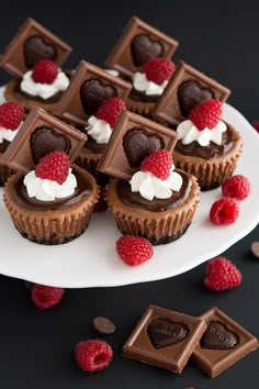 there are chocolates with raspberries on the plate