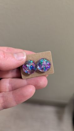 Resin earring studs with holographic  glitter.  Made in Missoula, Mt, USA. This is made to order, so each set may vary slightly. Iridescent Glitter Earrings As Gift, Iridescent Glitter Earrings For Gift, Glitter Round Earrings For Gifts, Purple Glitter Earrings For Gift, Iridescent Earrings Gift, Iridescent Round Earrings For Gift, Iridescent Earrings For Gift, Resin Stud Earrings, Resin Earring