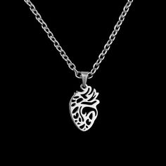 This Anatomical Heart Necklace is made entirely from high quality stainless steel - that's everything from the chain to the pendant (which measures approximately 23 mm x 12 mm). If the length you want isn't listed, then don't worry! Everything is made to order, so all you need to do is send me a message (before or within 24 hours of purchasing) confirming in inches the length that you would like. *Anatomical Heart Earrings are sold separately* Nickel Free Open Heart Stainless Steel Jewelry, Hypoallergenic Heart-shaped Stainless Steel Jewelry, Nickel-free Open Heart Stainless Steel Jewelry, Nickel-free Stainless Steel Open Heart Jewelry, Silver Stainless Steel Open Heart Jewelry, Silver Heart Necklace With Adjustable Chain In Stainless Steel, Silver Open Heart Stainless Steel Necklace, Silver Stainless Steel Heart Necklace With Adjustable Chain, Nickel-free Stainless Steel Heart Pendant Jewelry