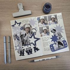 an open scrapbook with photos and pens