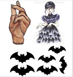 the paper doll is wearing a dress with bats on it, and an image of a hand holding a bat