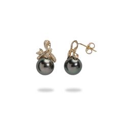 The Tahitian Black Pearl Earrings in Gold with Diamonds feature a timeless ribbon design with sparkling diamonds and lustrous "A" grade Tahitian black pearls. These elegant Tahitian pearl earrings will be a timeless addition to your collection. "Ribbon" Design Earrings 14k Yellow Gold 9-10mm Tahitian Black Pearls Natural Diamond: 0.12 CTW Classic Black Tahitian Pearl Earrings, Luxury Tahitian Pearl Earrings For Anniversary, Elegant Tahitian Pearl Earrings Gift, Elegant Tahitian Pearl Earrings For Formal Occasions, Luxury Black Pearl Earrings Gift, Luxury Black Pearl Earrings For Gift, Luxury Tahitian Pearl Earrings For Gift, Elegant Gold Tahitian Pearl Earrings, Luxury Tahitian Pearl Earrings Gift