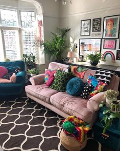 a living room filled with lots of colorful furniture