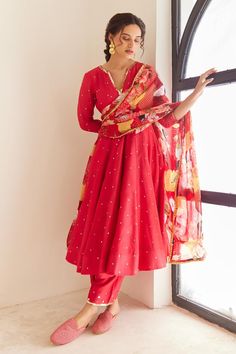 Red tiered anarkali embellished with sequin embroidery crafted in chanderi. Paired with a pant embellished with sequin embroidery and printed organza laced dupatta., Fit: Relaxed Tiered Anarkali, Pink Anarkali, Chanderi Dupatta, Red Kurta, Printed Organza, Embroidered Anarkali, Sequin Embroidery, Red Sequin, Women Kurta